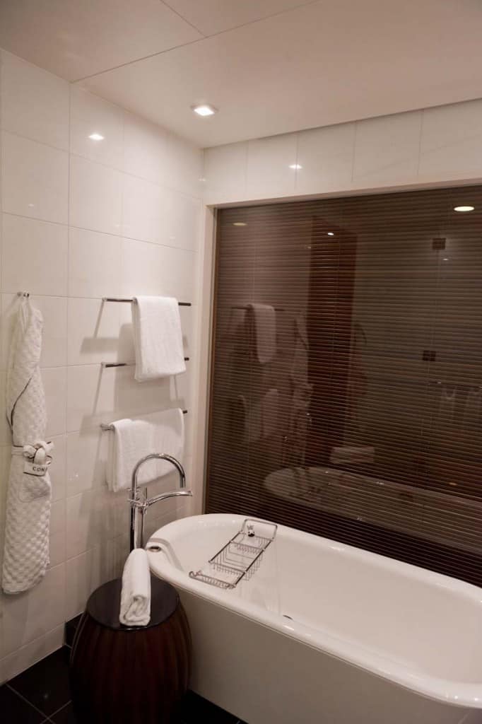Conrad Tokyo bath tub with electronically controlled blinds.