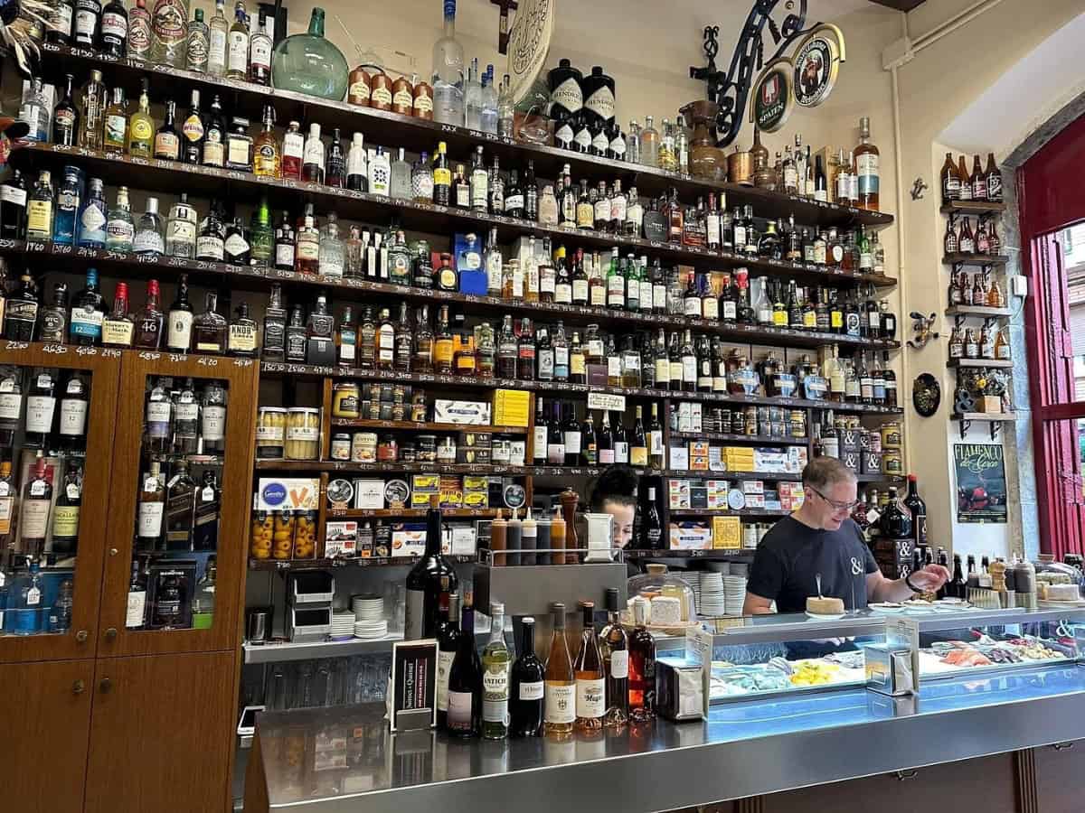 Top 10 Tapas Bars In Barcelona fully stocked bar at quimet & quimet