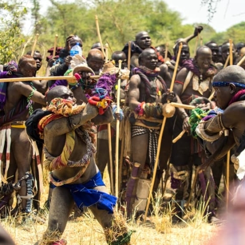 donga stick fighting tournament omo valley ethiopia mursi tribe featured