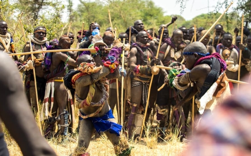 donga stick fighting tournament omo valley ethiopia mursi tribe featured