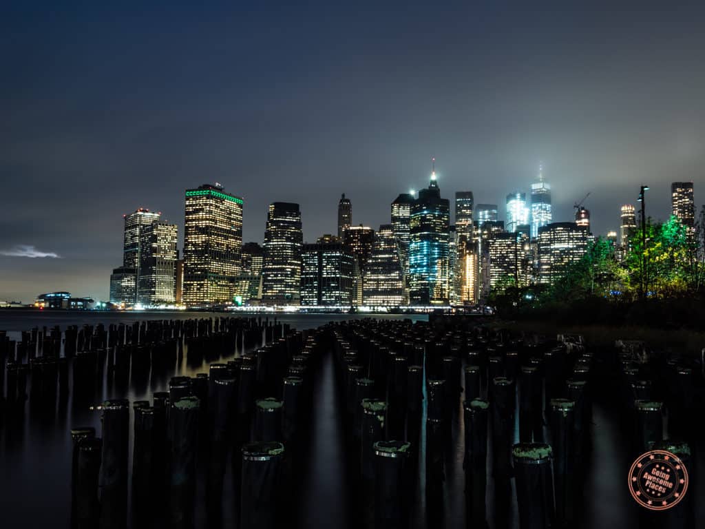 brooklyn bridge park pilings manhattan skyline at night