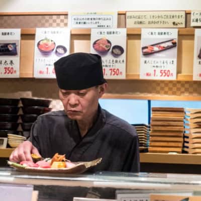 sushi chef preparing dish at uoriki