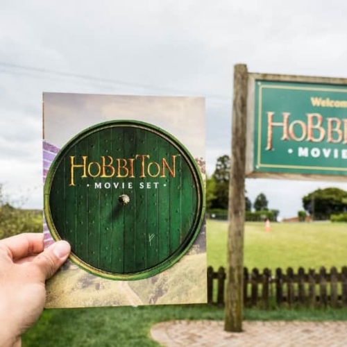 how to visit hobbiton movie set in new zealand pamphlet and sign