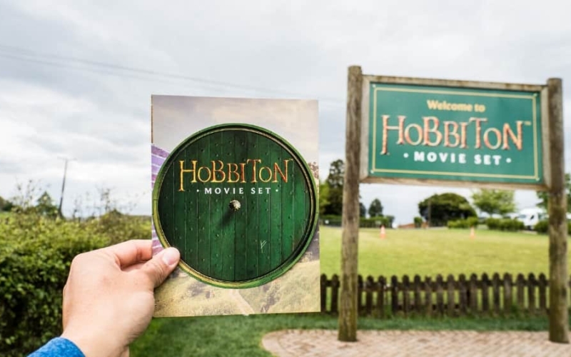 how to visit hobbiton movie set in new zealand pamphlet and sign