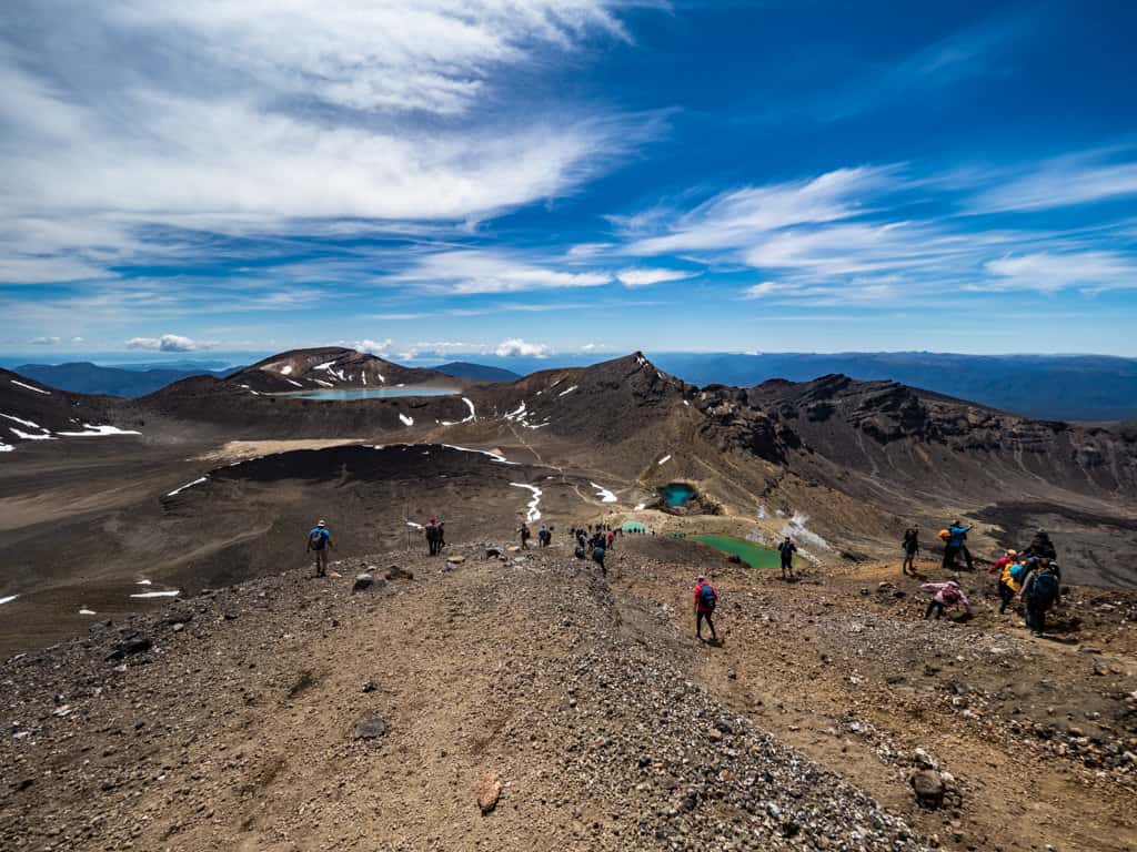 downhill rocky scramble in tongariro alpine crossing new zealand
