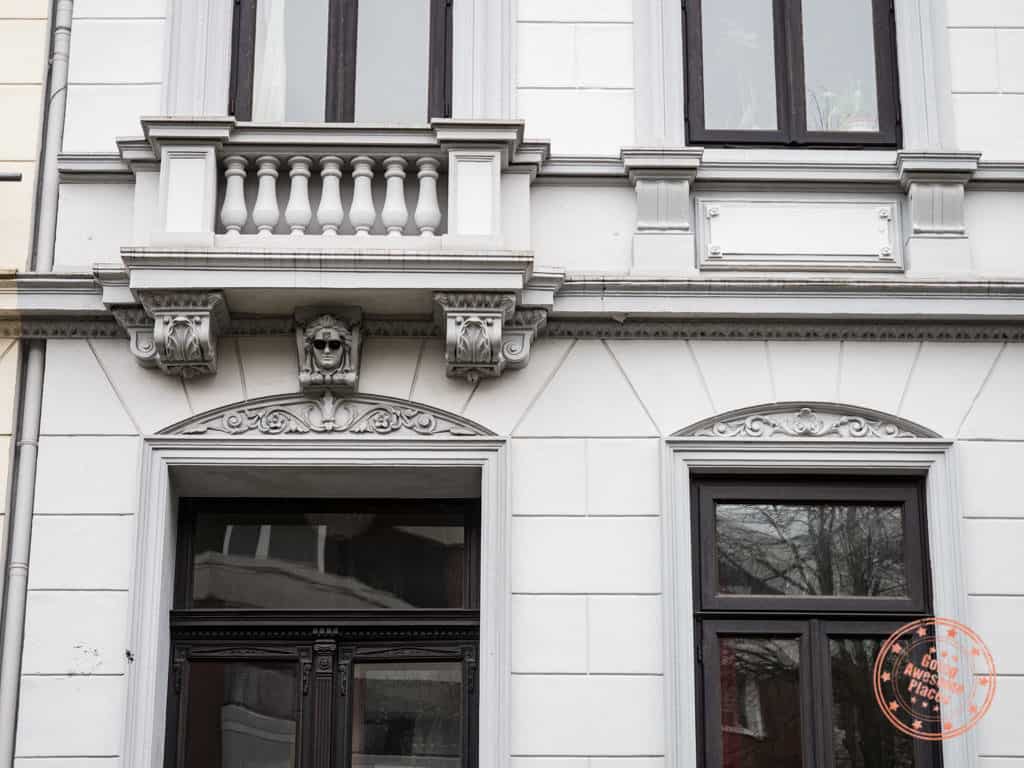 traditional townhouses in bremen with hipster sunglasses