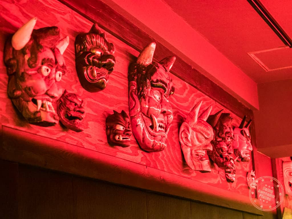 wall of oni masks at kikanbo near kanda