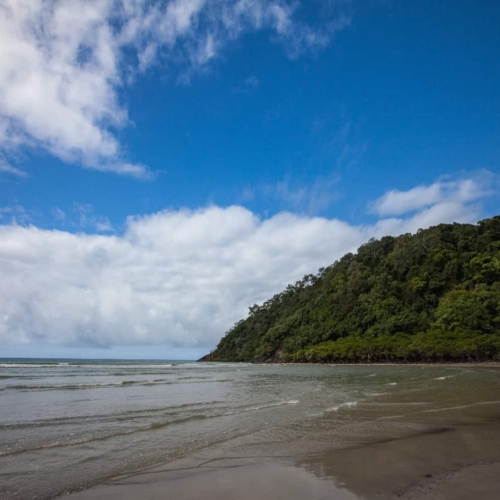 beach and island jetting out into water