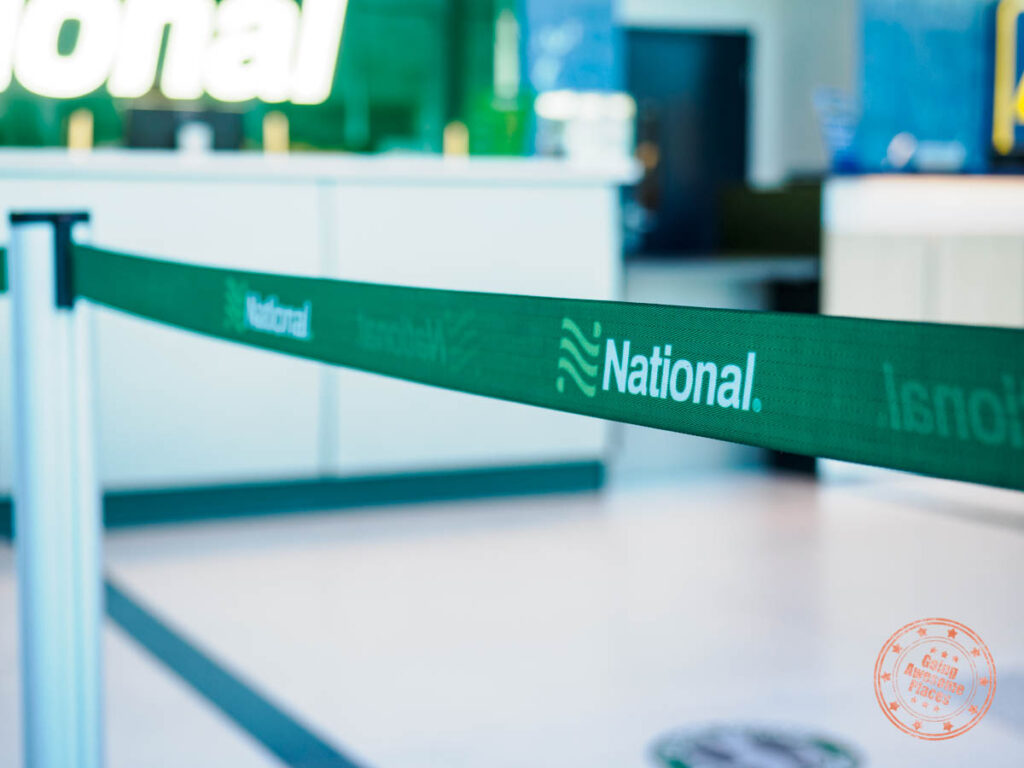 national rental car barrier tape in airport