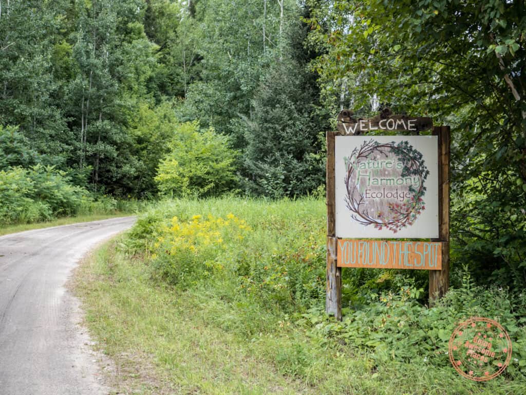 natures harmony eco lodge entrance sign