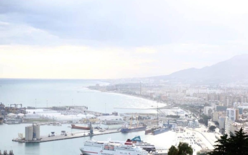 overlook of malaga spain coast with boats on water