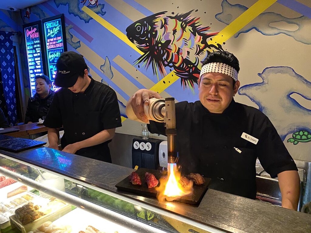 sushi by bou omakase with torched nigiri in nyc