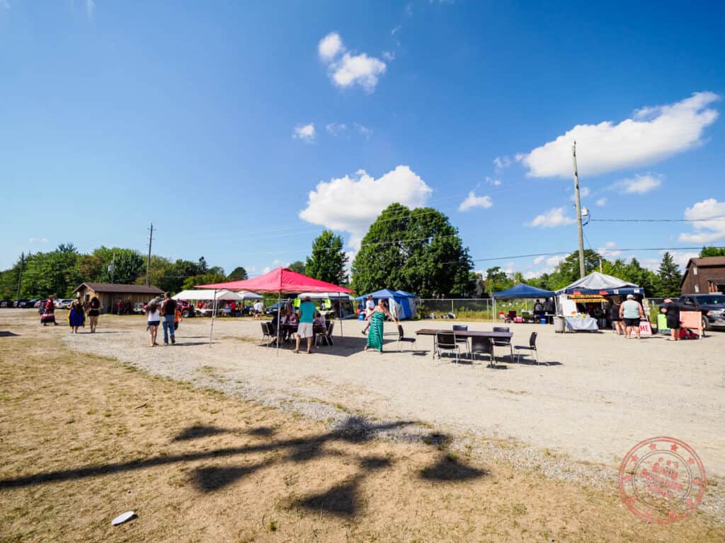 garden river pow wow food vendor set up with tented eating area