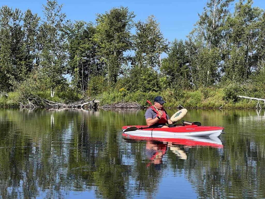 thrive tours kayaking experience with brad singing an honour song