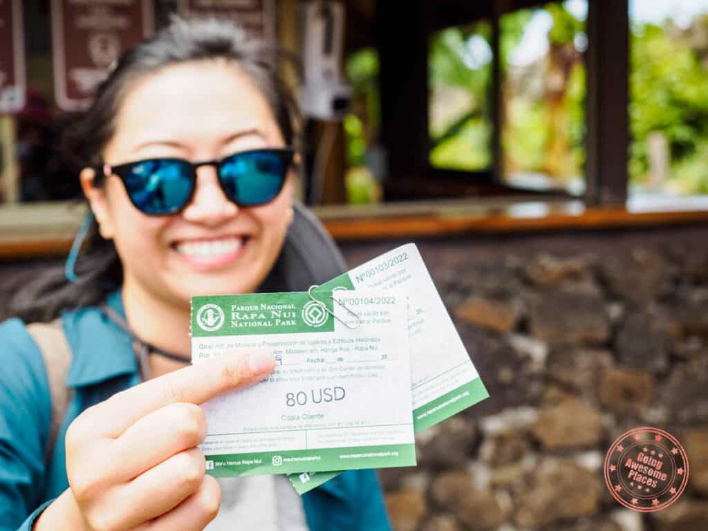 woman holding rapa nui national park tickets