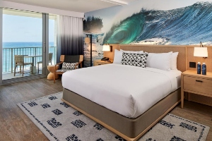 turtle bay resort room with king bed, ocean view, ocean wall decor