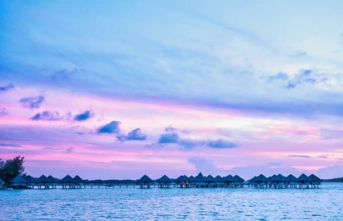 best beaches tahiti bungalows at sunset
