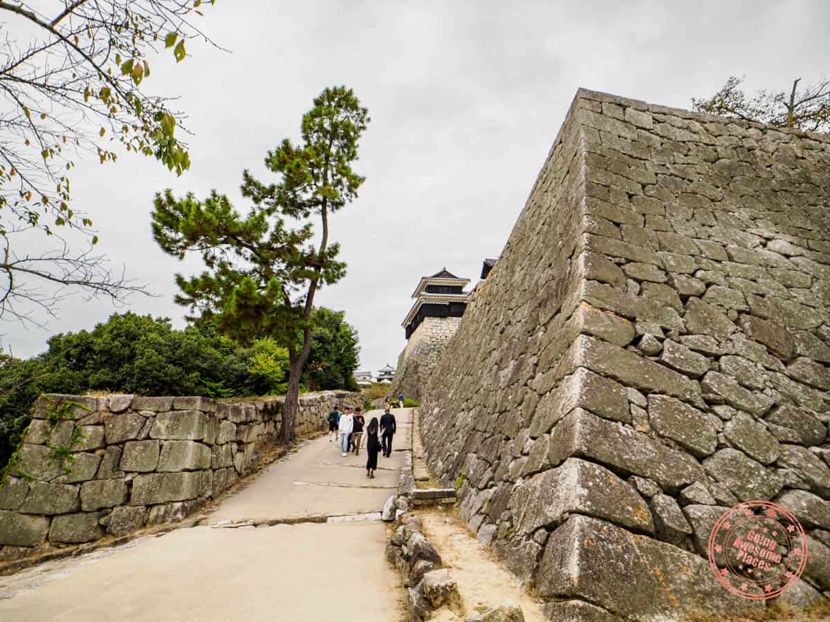 entering matsuyama castle and the massively fortified stone walls