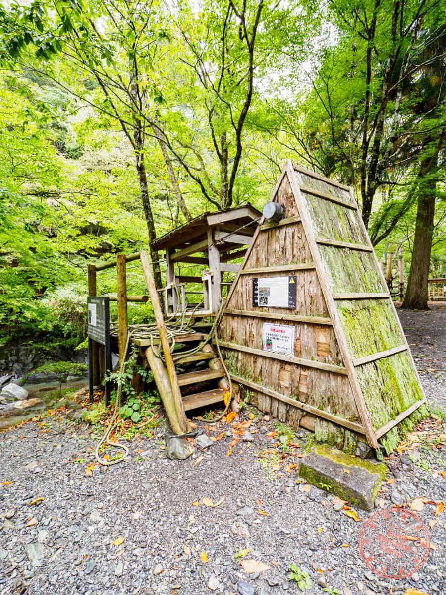 wild monkey bridge wooden cart at oku iya double vine bridge