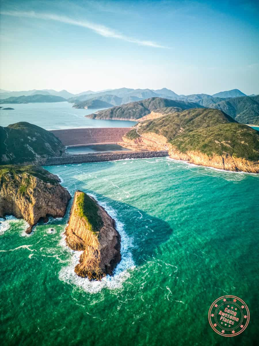 aerial view from the sea of high island reservoir east dam