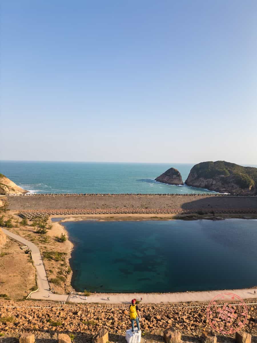 aerial view of travler enjoying view of the coffer dam and high island reservoir east dam