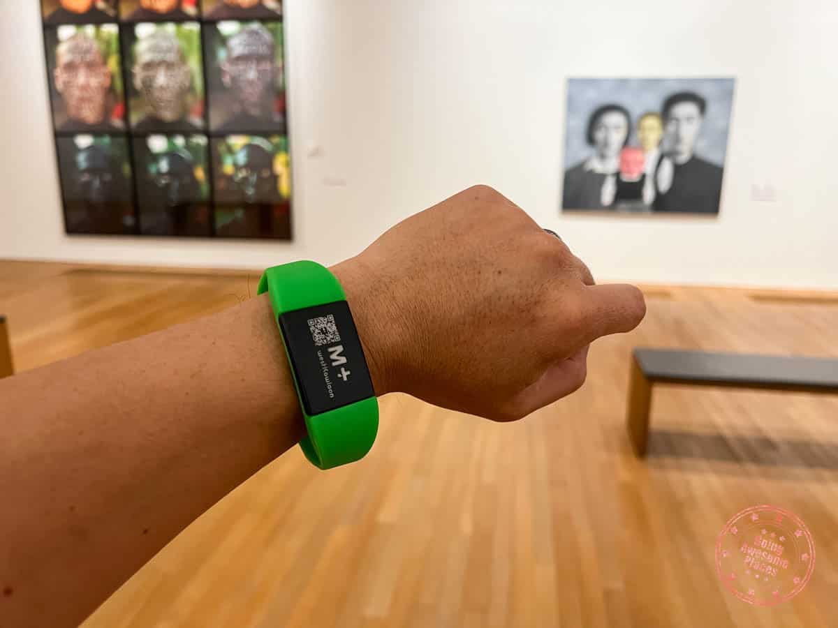 green wrist band locker key for m plus museum