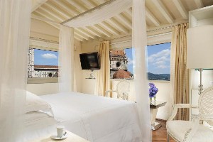 luxury brunelleschi hotel room with large windows with view