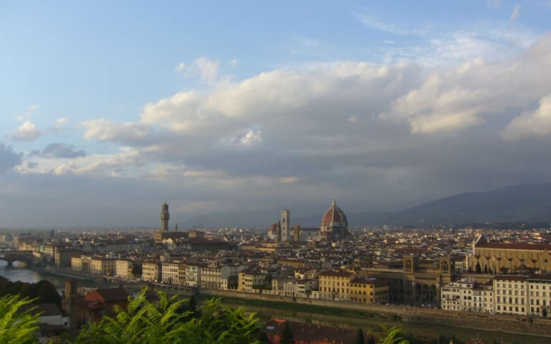 view of florence skyline from afar beneath cloudy sky