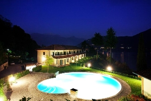 where to stay lake como tremezzo residence pool and complex view at night