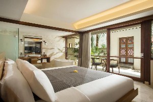 best places to stay in bali amnaya resort kuta king bed suite with sitting room and private outdoor area