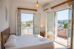 best places to stay in corfu limani apartments bedroom with views of the sea