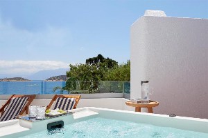 st. nicolas bay resort hotel villas private suite balcony with hot tub