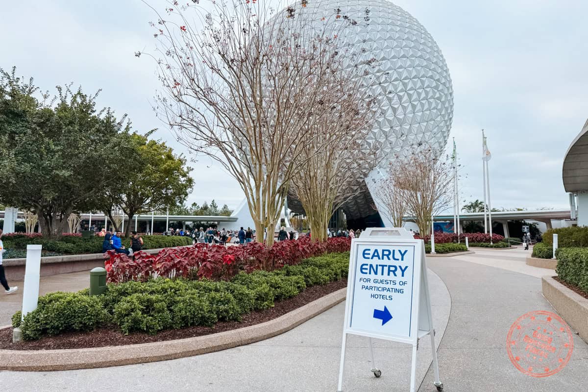 early entry sign directing guests at epcot