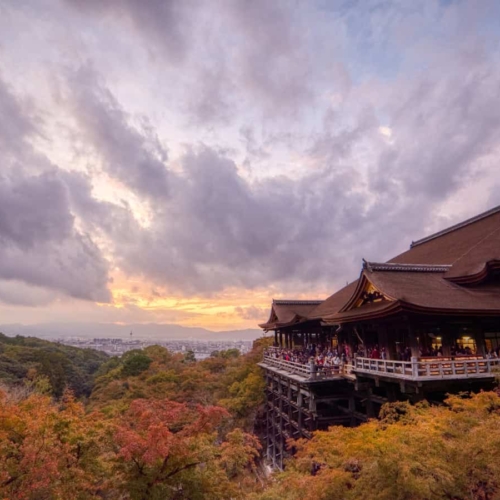 view of kiyomizu-dera within the trees during the fall