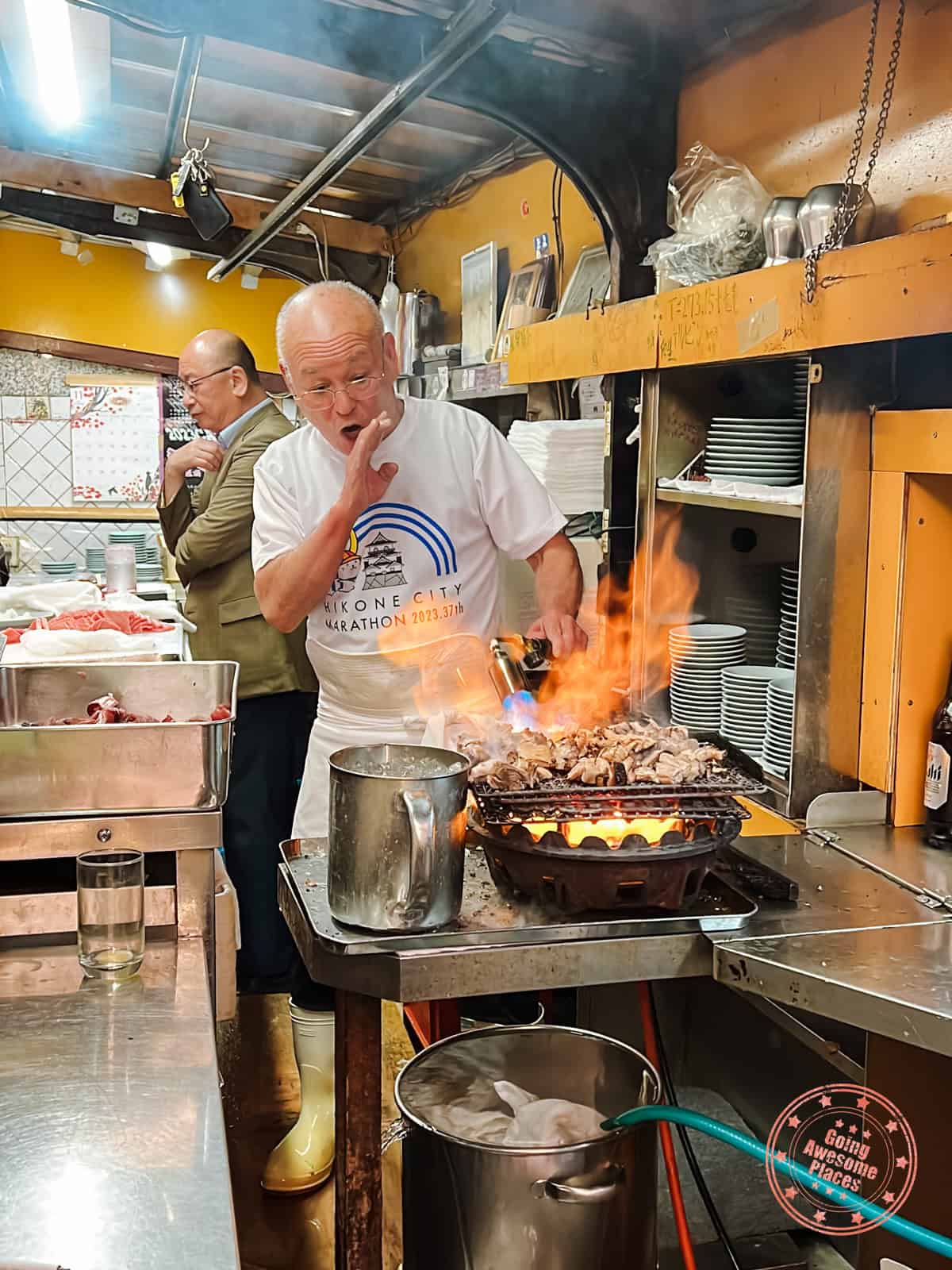 10 Day Japan Itinerary For First Timers - Modern Golden Route chef toyoji chikumoto tuna cheek flaming show in osaka