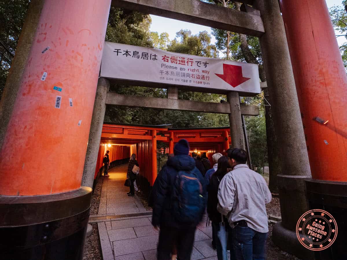 10 Day Japan Itinerary For First Timers - Modern Golden Route signage for the right one way path at fushimi inari shrine