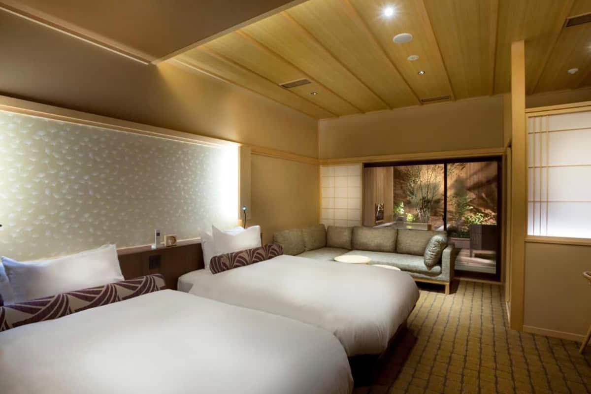 10 Day Japan Itinerary For First Timers - Modern Golden Route saka hotel kyoto bedroom interior with private open air bath onsen