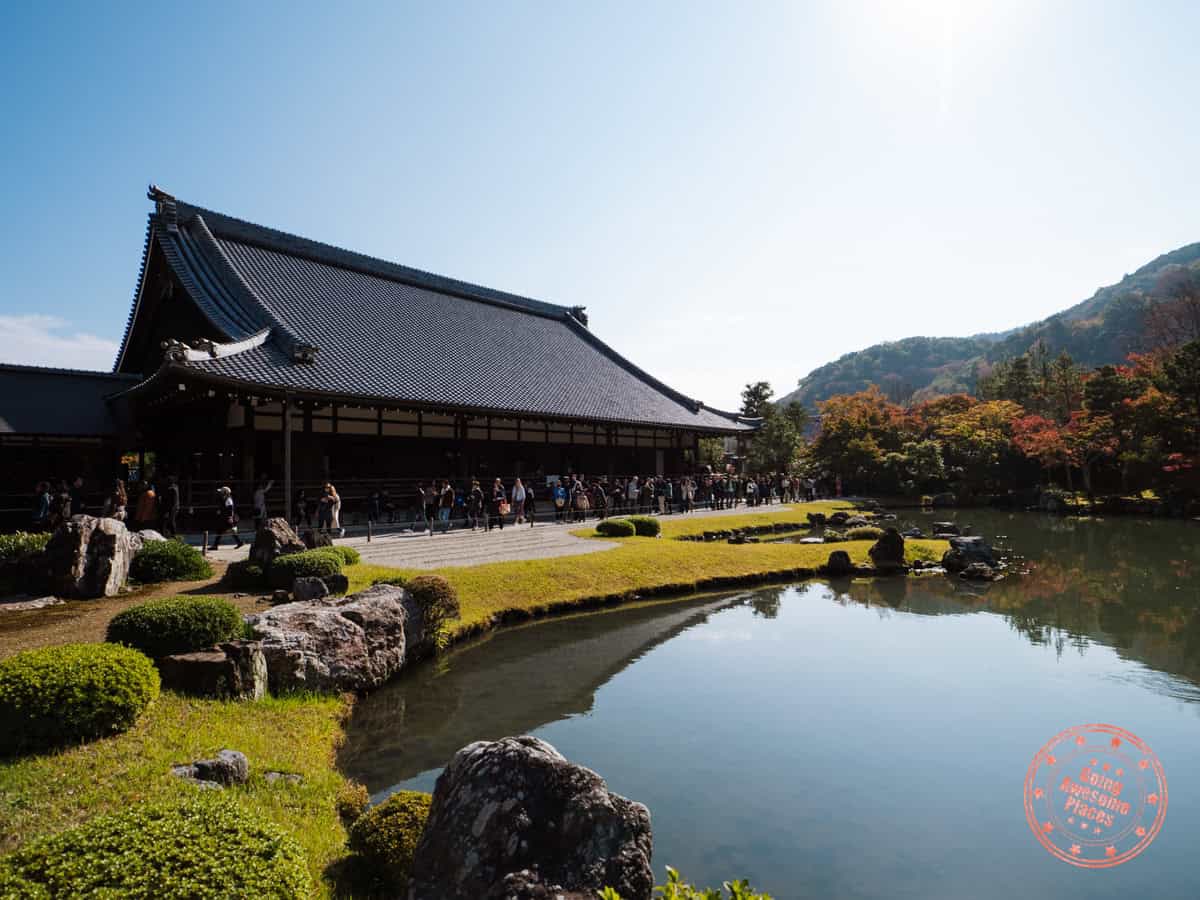 tenryu ji temple behind pond