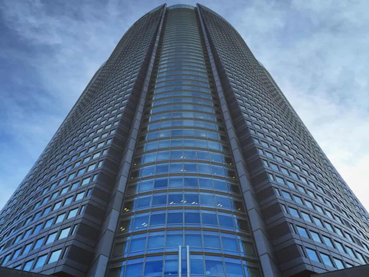 Where To Find The Best Observation Decks In Tokyo For Stunning Cityscapes ground view looking up at roppongi hills mori tower