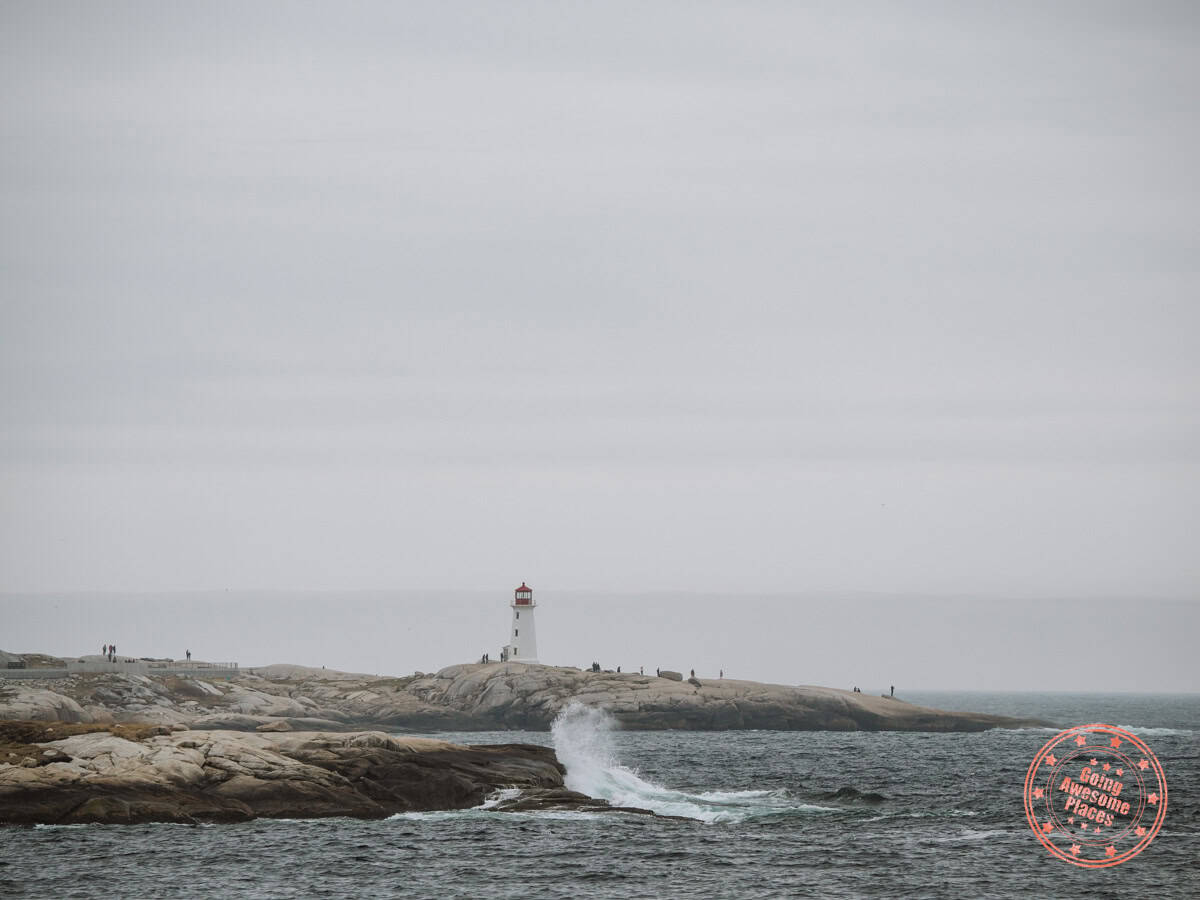 crashing waves at peggy's cove from the cranberry cove lookout point