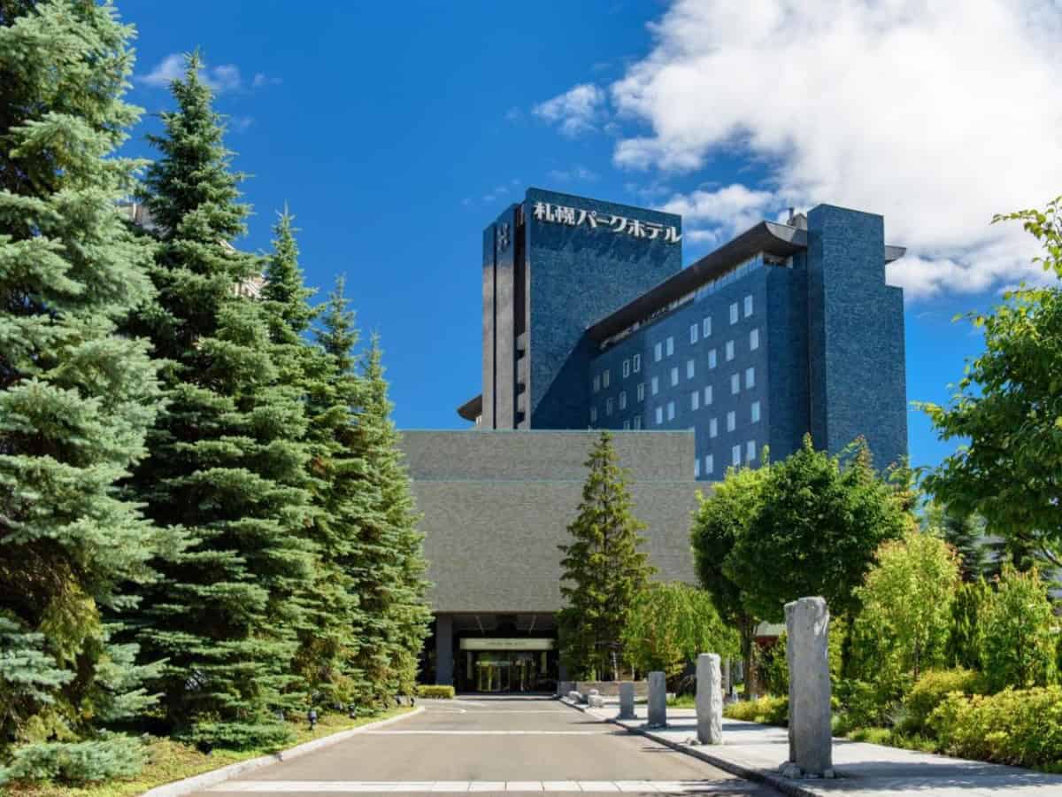 street view of sapporo park hotel surrounded by trees