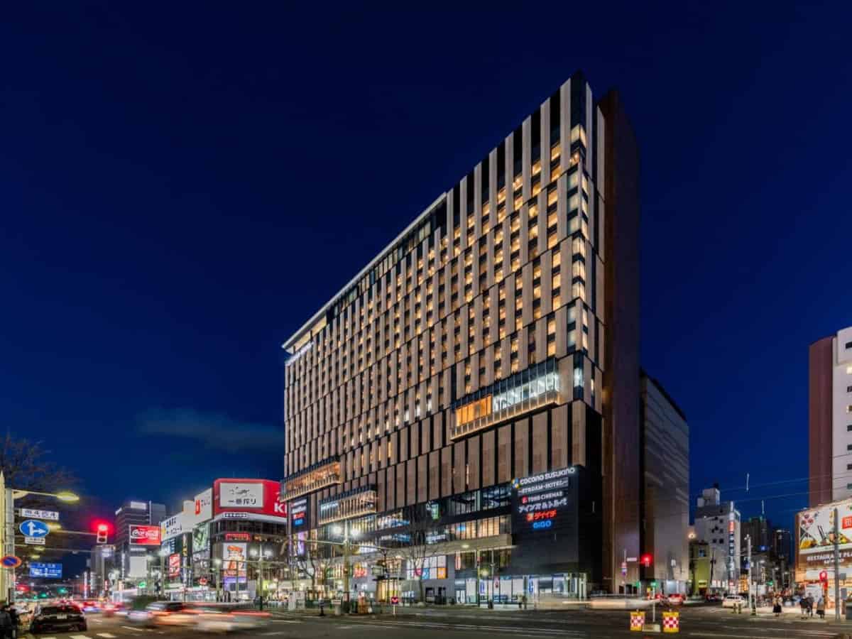 sapporo stream hotel building lit up at night