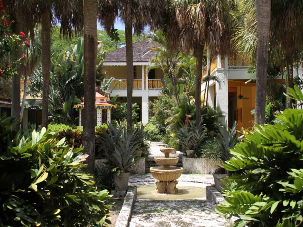 inside the gardens and outside bonnet house museum