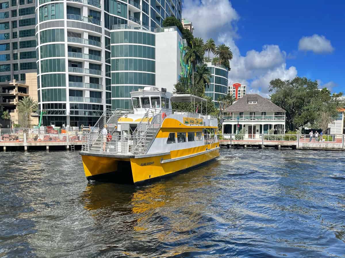 water taxi in front of historic stranahan house museum